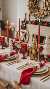 Tablescape ideas exudes luxury with its rich red and gold palette. Tall red candles, gold-accented cutlery, and shimmering goblets create a dramatic and festive centerpiece. Add miniature white Christmas trees for a playful touch, making it ideal for transitioning from Thanksgiving to Christmas.