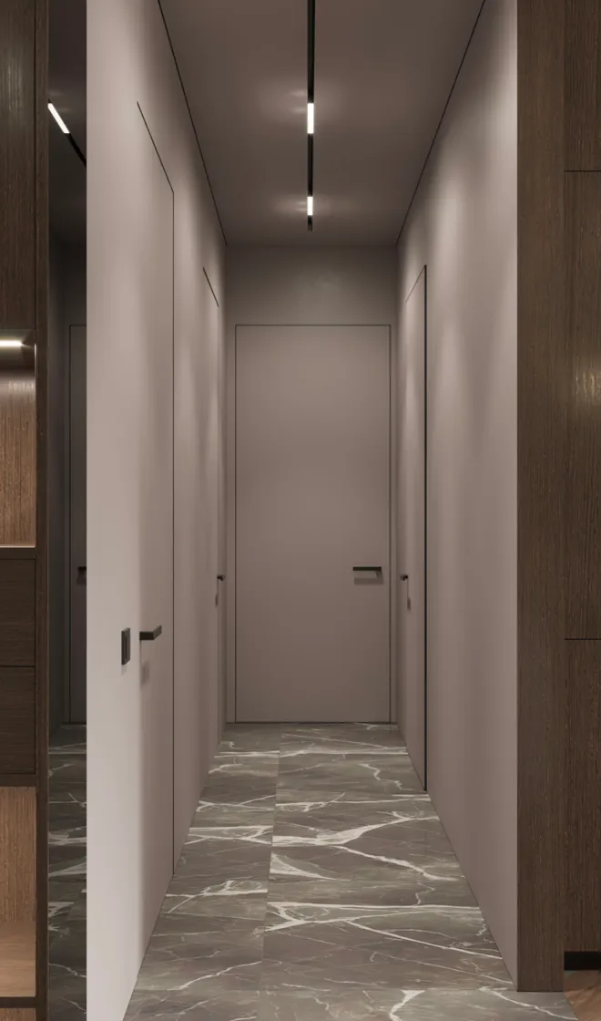 Elegant Hallway Lighting: Transform a simple hallway with concealed lighting and warm tones. Marble flooring adds luxury and sophistication to this transitional space. #InteriorDesign #LuxuryLiving 