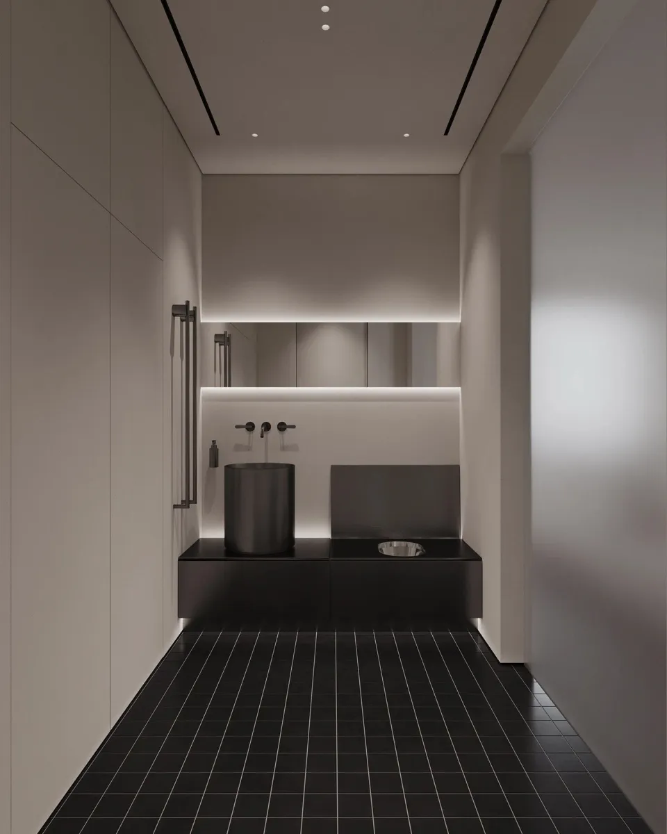 Spa-like bathroom with freestanding tub and dark wood accents. This bathroom is a sanctuary. The freestanding tub is the star, but the dark wood panels and geometric floor tiles add depth and contrast.