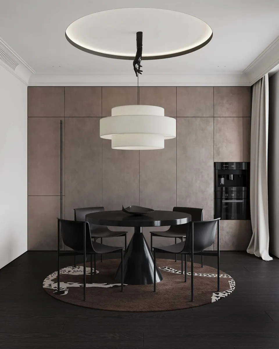 Modern kitchen with veined stone backsplash and warm wood cabinetry. This kitchen is a masterclass in texture. The veined stone backsplash is a showstopper, with earthy reds and grays that add depth. Paired with taupe cabinetry and dark wood floors, it’s the warm apartment aesthetic in action.