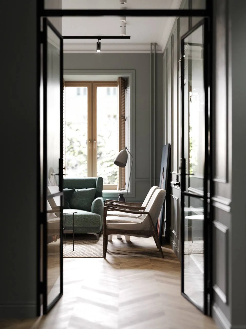 Chic seating area with plush green sofa, beige armchairs, low-profile coffee table, beige rug, and pendant lighting creating a luxurious yet cozy space.