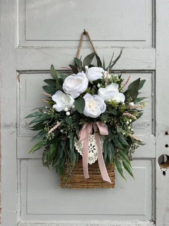 A beautiful wreath is the perfect way to greet guests and set the tone for your home. Opt for a classic heart-shaped valentine's day wreath adorned with red roses or go for a minimalist style using dried flowers and eucalyptus. If you prefer a rustic touch, consider a burlap wreath with subtle heart-shaped accents, blending vintage and modern aesthetics.