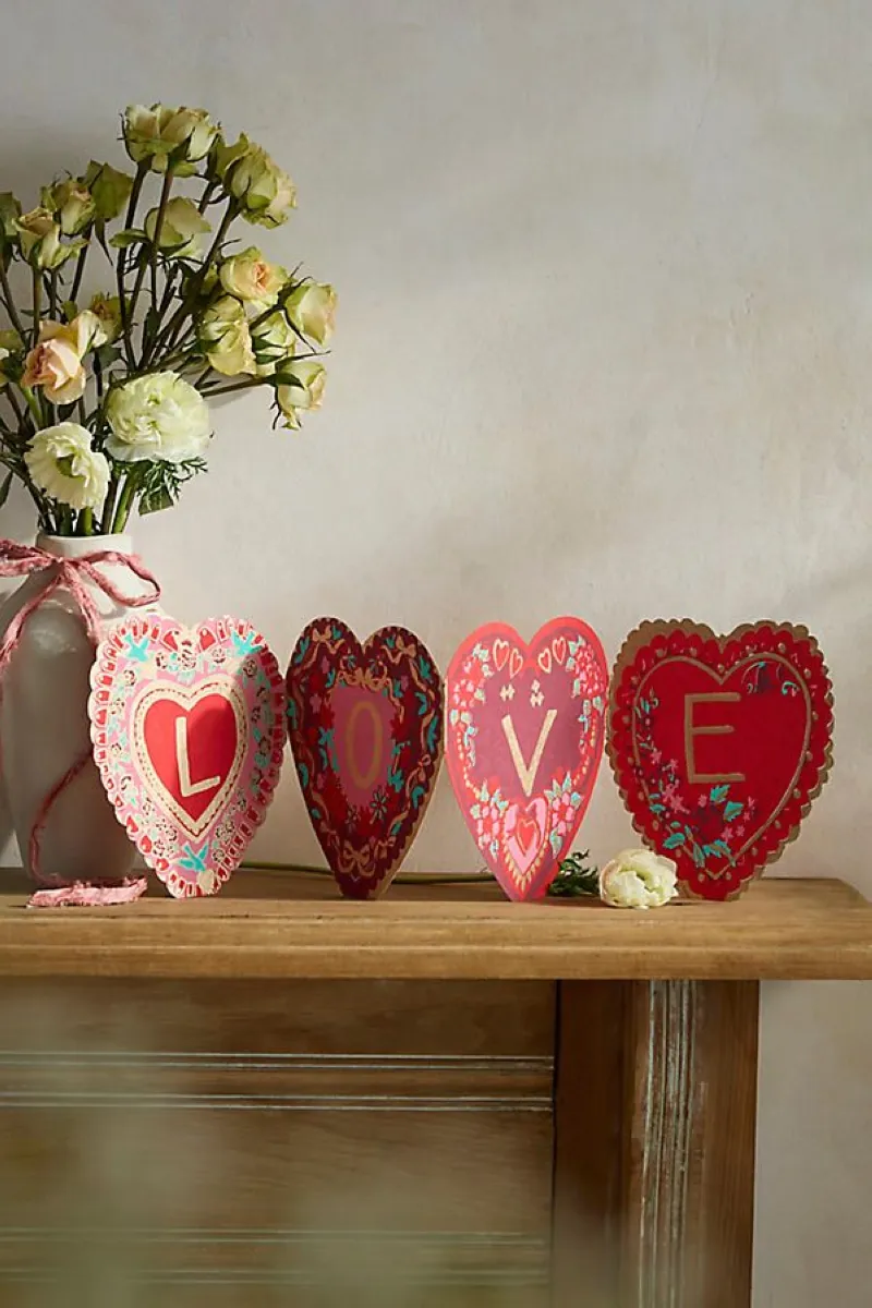 For those who love nostalgia, vintage valentine decor is a charming way to celebrate. Look for antique-style ornaments, Victorian-inspired cherubs, or even retro Valentine’s postcards to display in decorative frames. Use these to create a vignette on your coffee table or bookshelf for a timeless and romantic aesthetic.