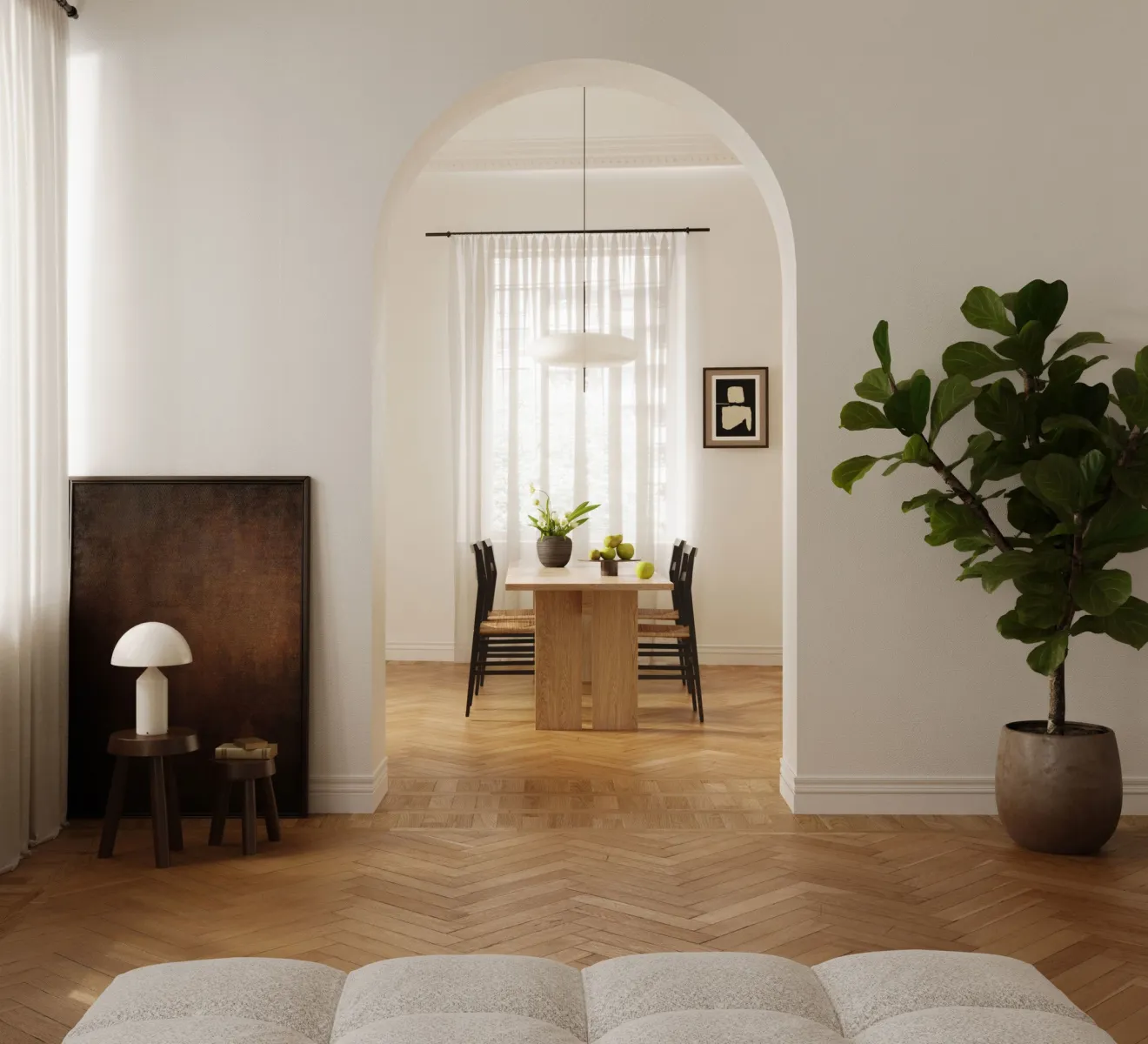 Modern dining room with a wooden table, black chairs, and natural accents. Minimalist styling with greenery and warm textures. #DiningRoomDecor #ModernMinimalism