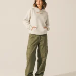 A cozy beige hoodie with a small Morning girl detail on the front and a breakfast illustration on the back. Feels right for slow mornings, coffee runs, work from home days, and weekends that start quietly. Easy to style with jeans or leggings. Looks worn in, not styled out. #cozymorning #hoodieoutfit #slowliving #casualstyle