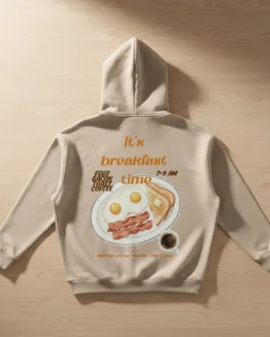 A cozy beige hoodie with a small Morning girl detail on the front and a breakfast illustration on the back. Feels right for slow mornings, coffee runs, work from home days, and weekends that start quietly. Easy to style with jeans or leggings. Looks worn in, not styled out. #cozymorning #hoodieoutfit #slowliving #casualstyle