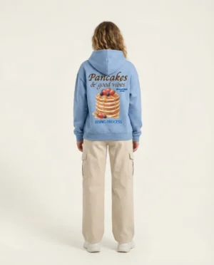 A closer look at the pancake-inspired design that started it all 🥞 I created this hoodie as a love letter to breakfast culture, good vibes and slow mornings. Ideal for food lovers, brunch aesthetics, cozy fashion boards and gift inspiration. #flatlaystyle #clothingaesthetic #breakfastclub #hoodiecollection #graphictees #streetwearsource