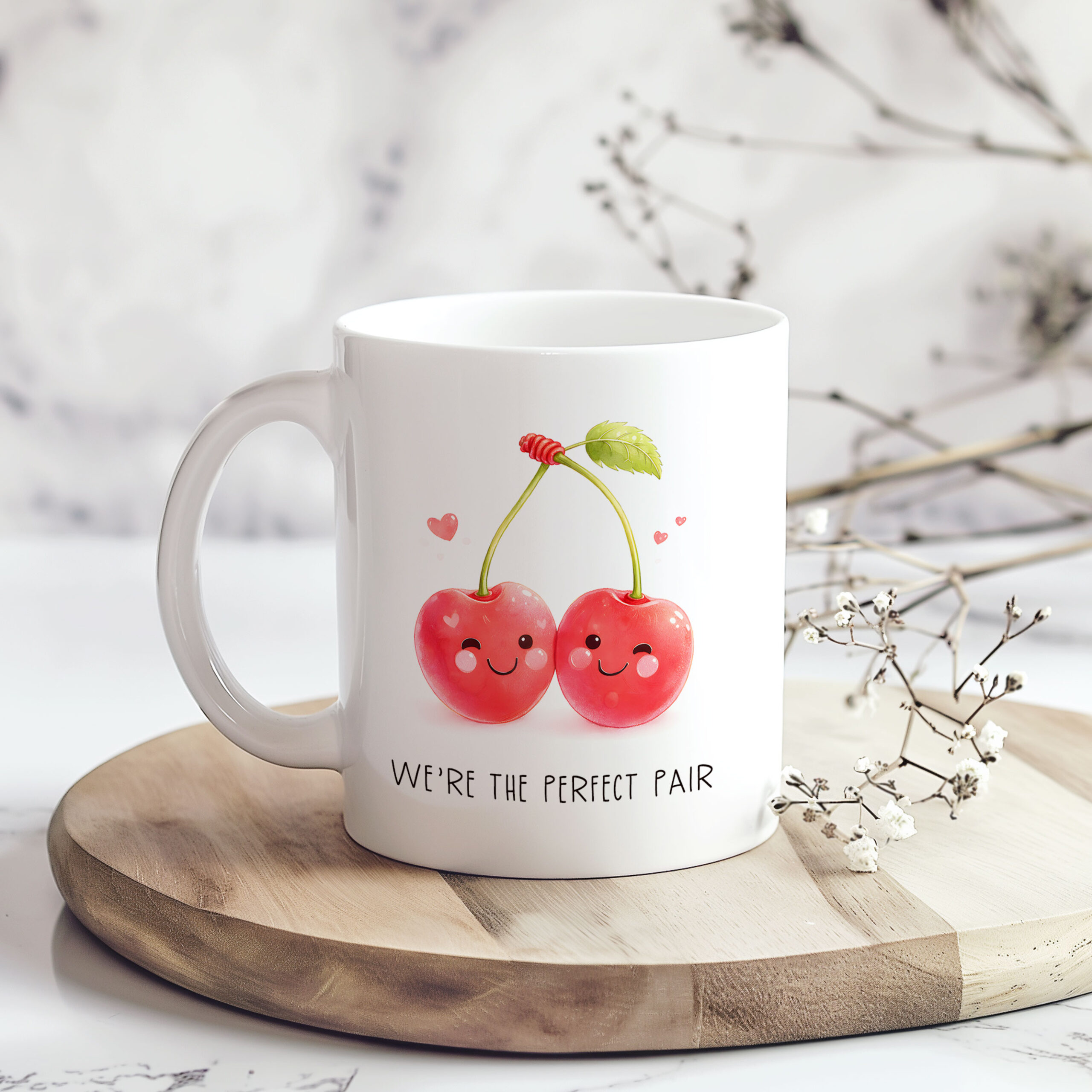 20260104130937-1f0e96e9-ee92-6472-8458-9e9268efea2c.jpg A delightful coffee mug featuring two smiling cherries and the phrase We’re the Perfect Pair. This 11 oz white ceramic mug is microwave‑safe and dishwasher‑safe, making it perfect for Valentine’s Day gifting or everyday drinkware.
