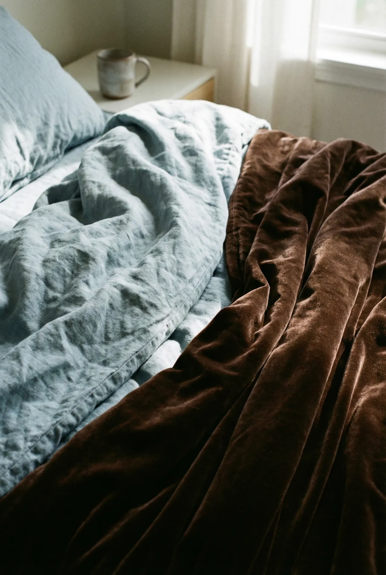 Color trends 2026 home decor showing cool blue and chocolate brown color combination.