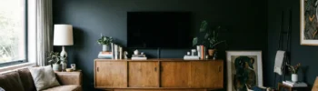 The 'Floating Island' mistake is ruining your living room vibe. See why mounting your TV on a plain white wall creates a 'black hole' effect and the simple $40 paint trick to fix it instantly. #tvwall #livingroommistakes #interiordesignhacks #darkpaint