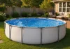 I Built a $200 Stock Tank Pool in My Backyard. Here’s Everything I Know Now. A tan stack pool in my backyard in the afternoon light